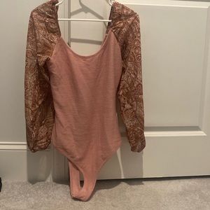 Body suit never worn!